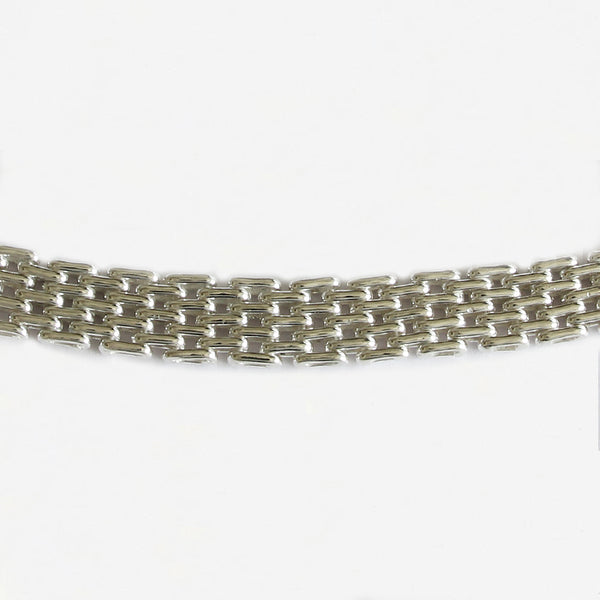 a silver modern brick design necklace