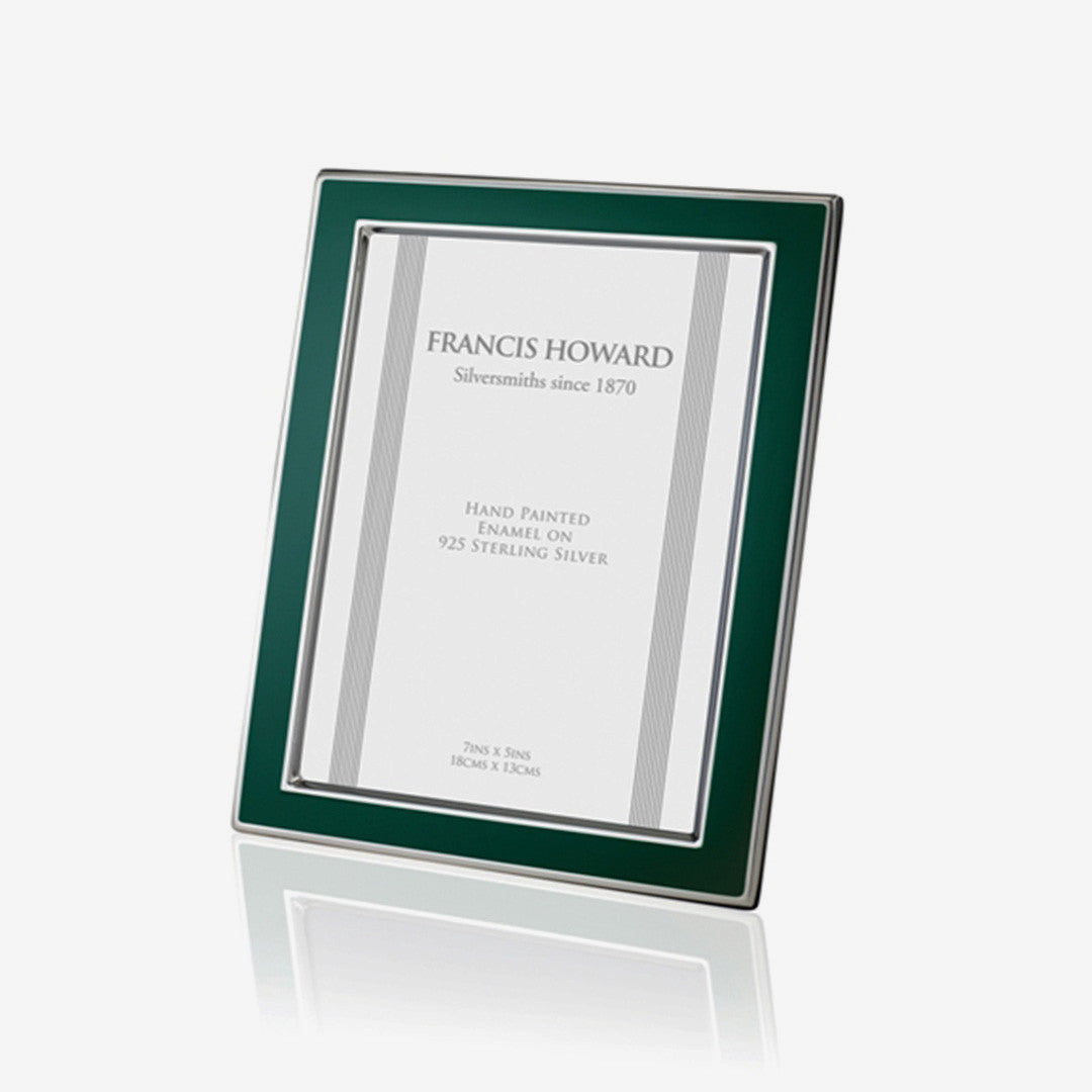 silver photo frame with green enamel edge and a wooden back english made by francis howard