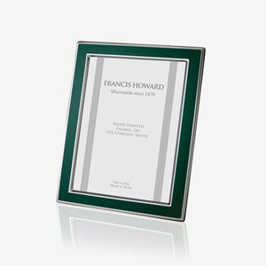 silver photo frame with green enamel edge and a wooden back english made by francis howard