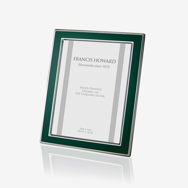 silver photo frame with green enamel edge and a wooden back english made by francis howard
