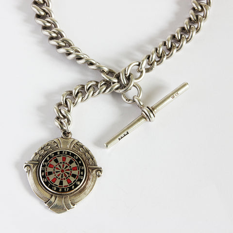 a silver secondhand watch chain with t bar and dart board fob 