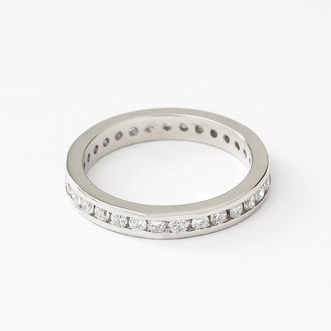 diamond set full eternity ring in a channel setting white metal