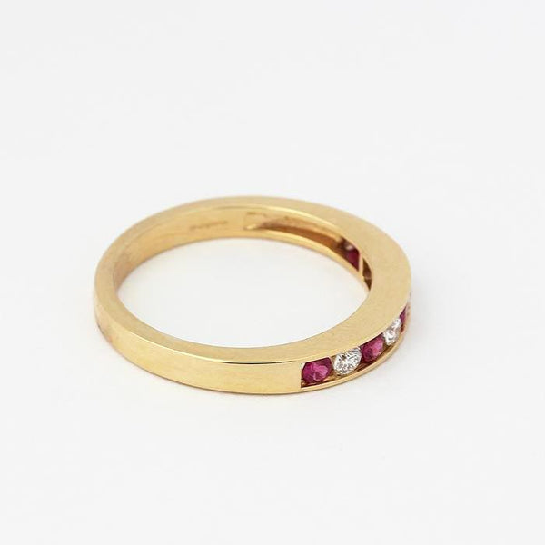 ruby and diamond half eternity ring in yellow gold with 5 rubies and 4 diamonds