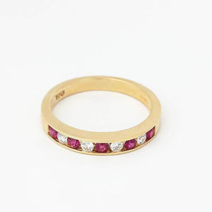 ruby and diamond half eternity ring in yellow gold with 5 rubies and 4 diamonds