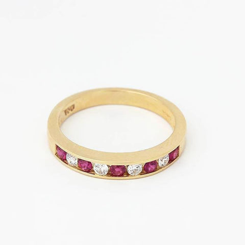 ruby and diamond half eternity ring in yellow gold with 5 rubies and 4 diamonds