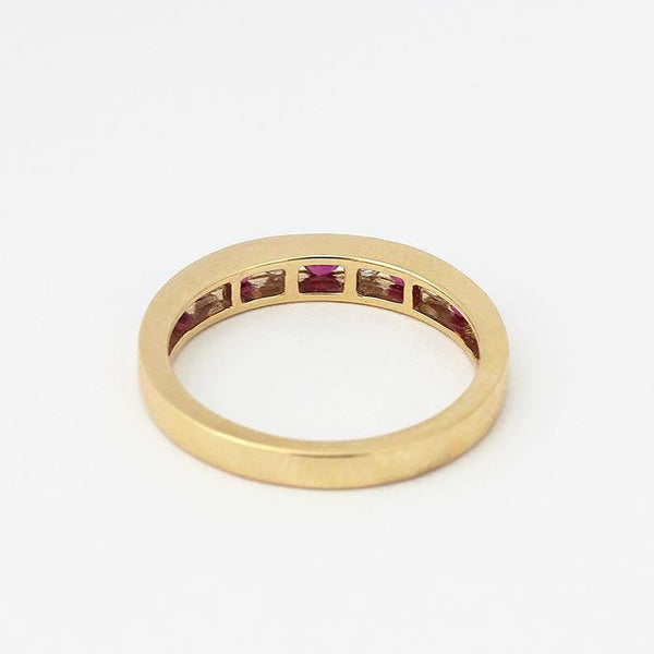 ruby and diamond half eternity ring in yellow gold with 5 rubies and 4 diamonds