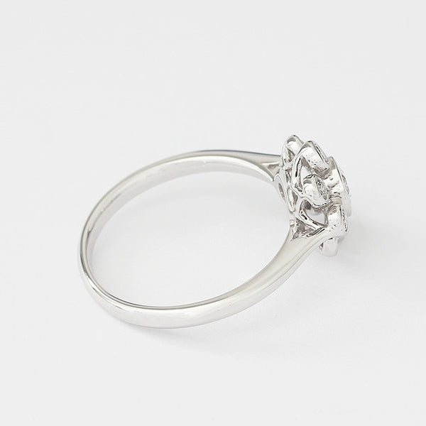 a contemporary floral shaped diamond cluster ring in 18ct white gold