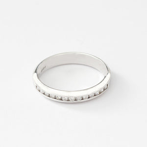 a diamond eternity ring in platinum with a channel setting