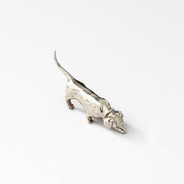 a sterling silver dachshund sniffing dog figure model with full british hallmark and solid in weight