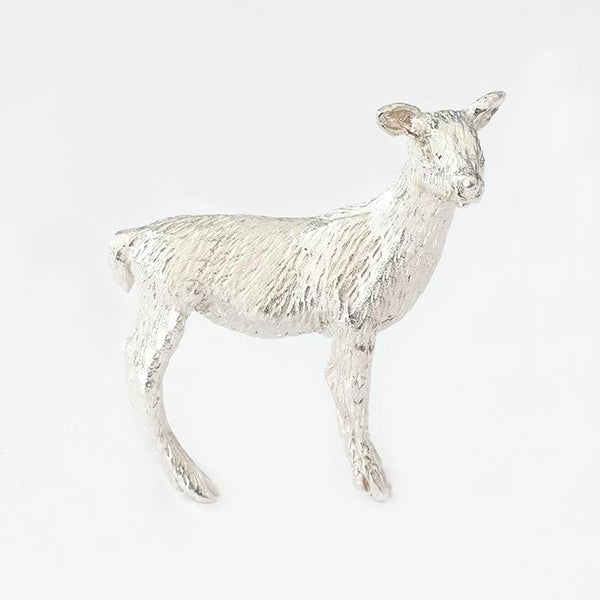 a silver small deer figure all solid in weight and british made