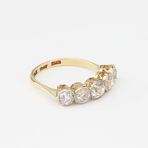 diamond 5 stone ring with rubover set yellow gold and platinum