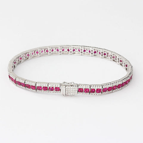 ruby and diamond line bracelet set in 18ct white gold