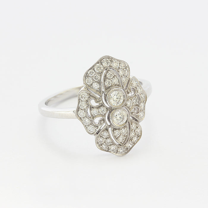 a beautiful cluster art deco style ring in white gold