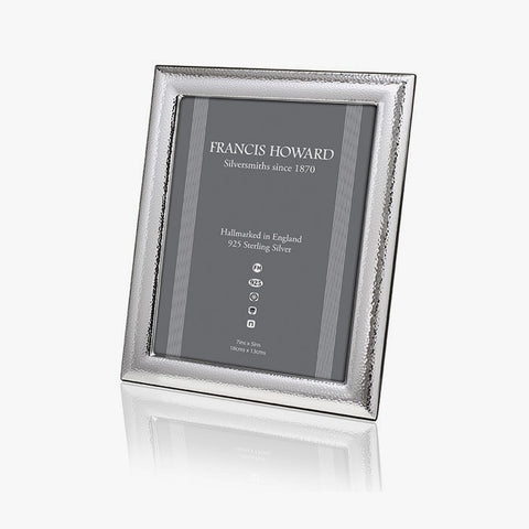 english made sterling silver photo frame with a hammered design and wooden back made in sheffield