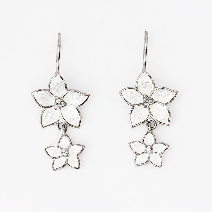 silver flower drop earrings with hook fittings and white enamel petals with small diamonds in the centre