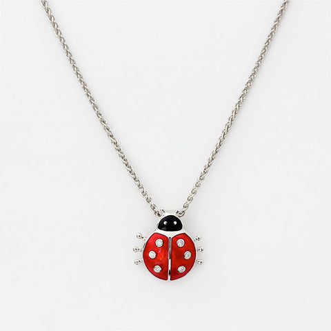 ladybird pendant with red enamel and stones with silver necklace