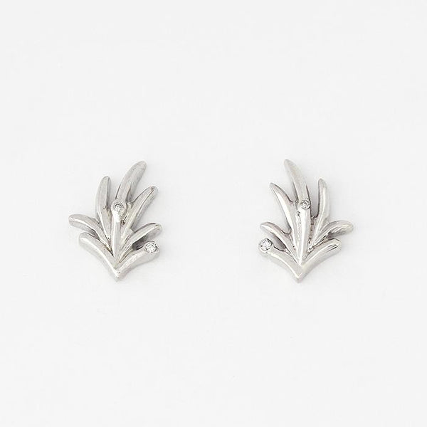 leaf pattern set of silver earring studs with 2 small diamonds set within with a post and butterfly fitting