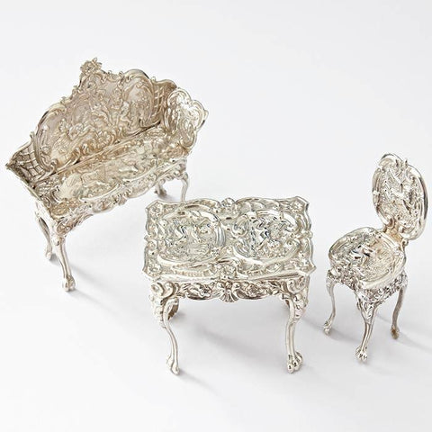a sterling silver miniature dolls house furniture set chair table and sofa all hallmarked birmingham 1901