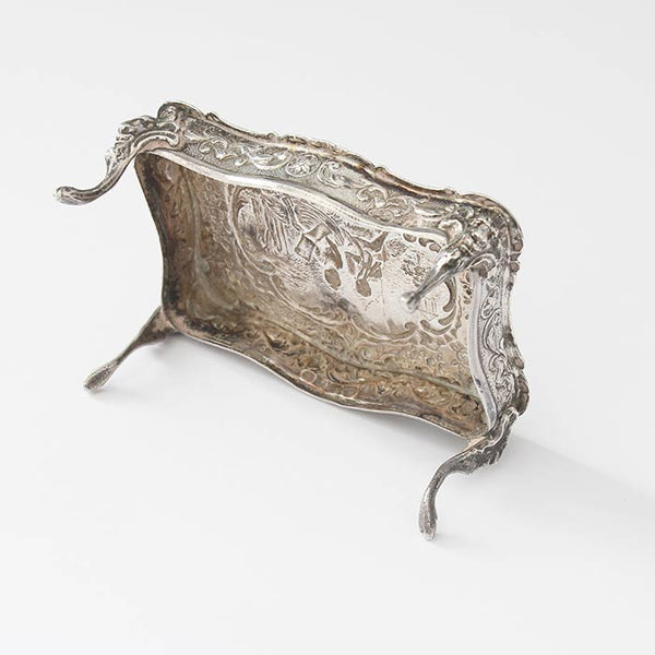 a beautiful sterling silver miniature dolls house table with an engraved scene dated and hallmarked london 1901