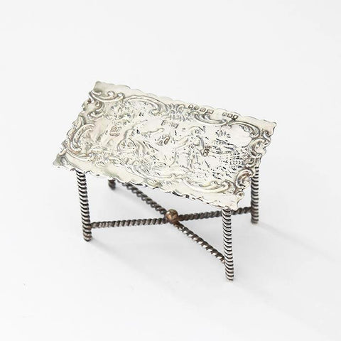 an antique miniature decorative rectangular table dolls house size in sterling silver with beaded edge legs dated 1898
