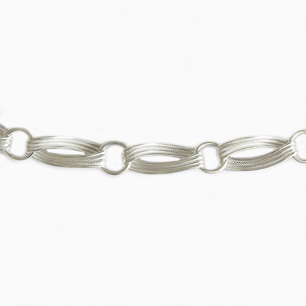 a silver patterned oval modern contemporary necklace collar