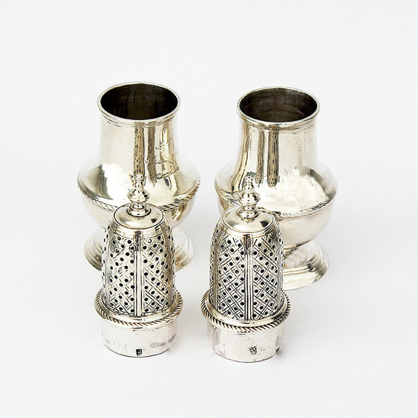 a georgian set of peppers in silver and hallmarked for 1749
