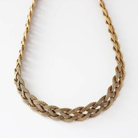 a secondhand yellow gold plaited milanese necklace in 14 carat yellow gold dated 1967