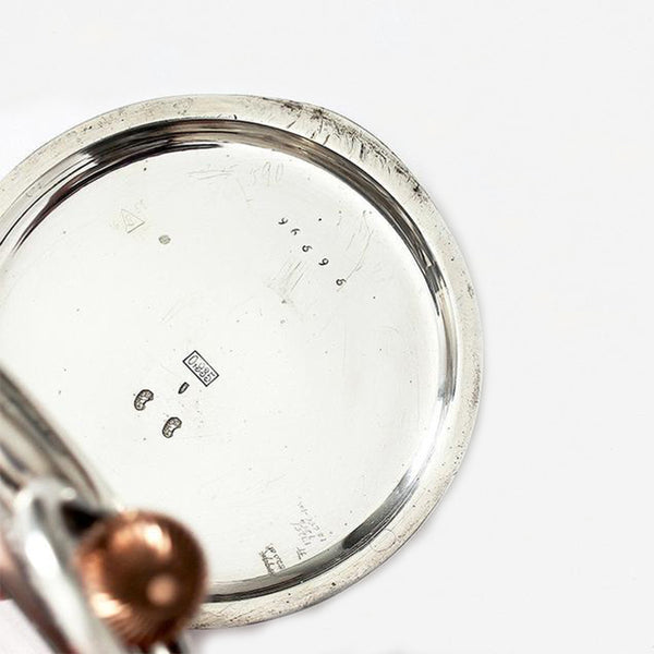 a goliath pocket watch with engraving in silver