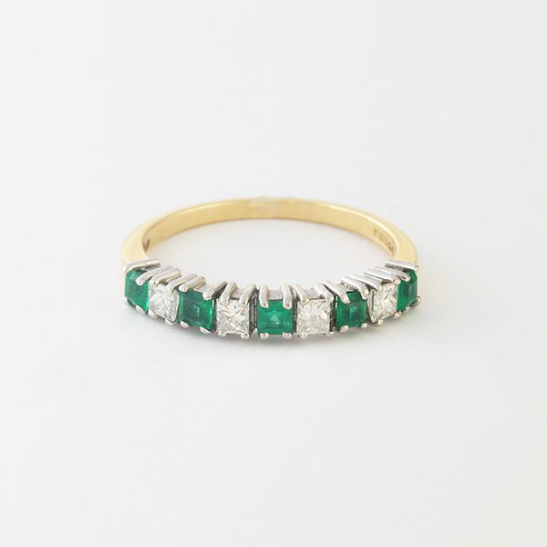 a superb gold emerald diamond square half eternity ring