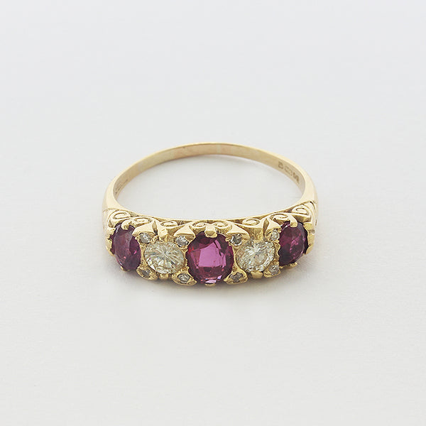 a ruby and diamond carved yellow gold victorian style ring