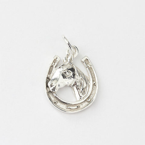 silver horse shoe and horse head charm 