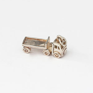 silver moving truck charm