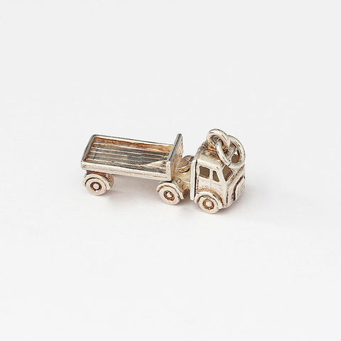 silver moving truck charm