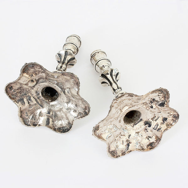 antique taper sticks in sterling silver patterned 1853