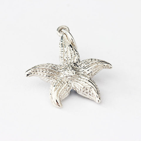 silver starfish charm with pattern