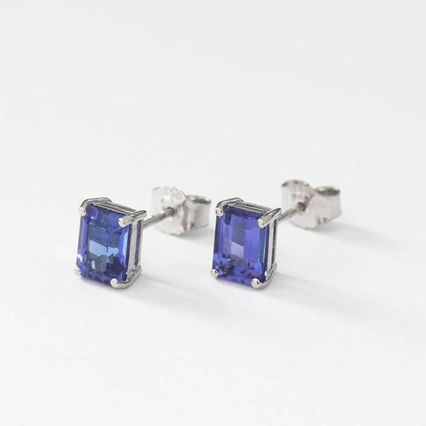 tanzanite stud earrings in a rectangular shape with 4 claw settings and set in 18 carat white gold