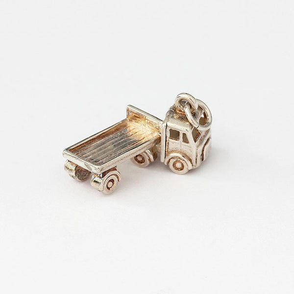 sterling silver truck charm which moves around on hinge
